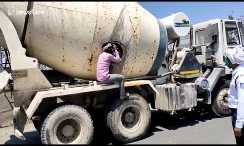 Hindistan polisi trafikteki kilitleme sırasında çimento mikserinde yasadışı seyahat eden 18 kişiyi yakaladı