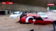 Sele Kapılıp Sürüklenen Otomobili Elleriyle Tutmaya Çalıştı
